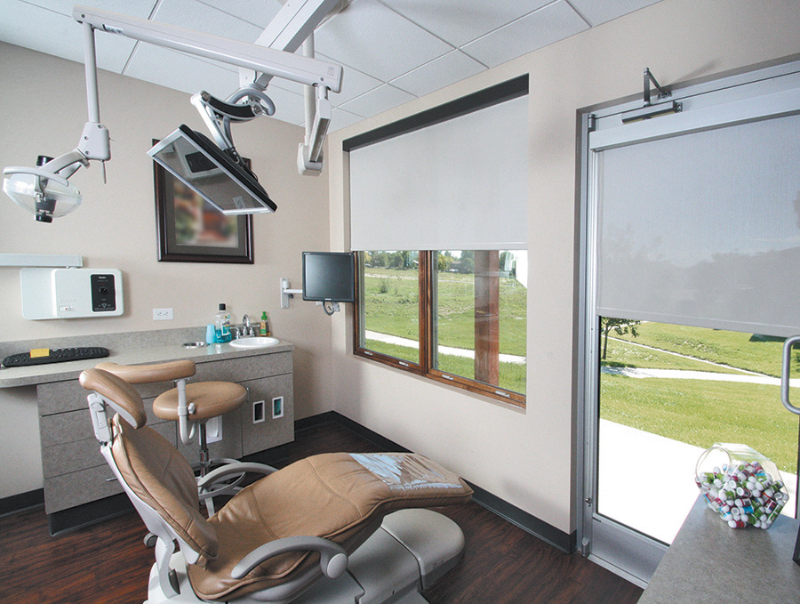 grey solar screen shades in an urban loft living room