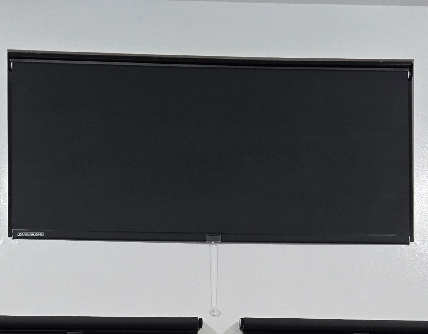 Photo of custom solar screen shade installed