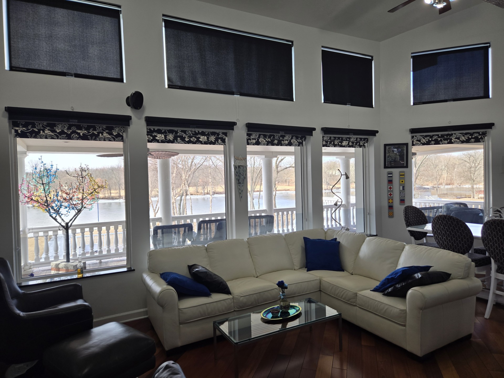 Photo of custom solar screen shades in a living room