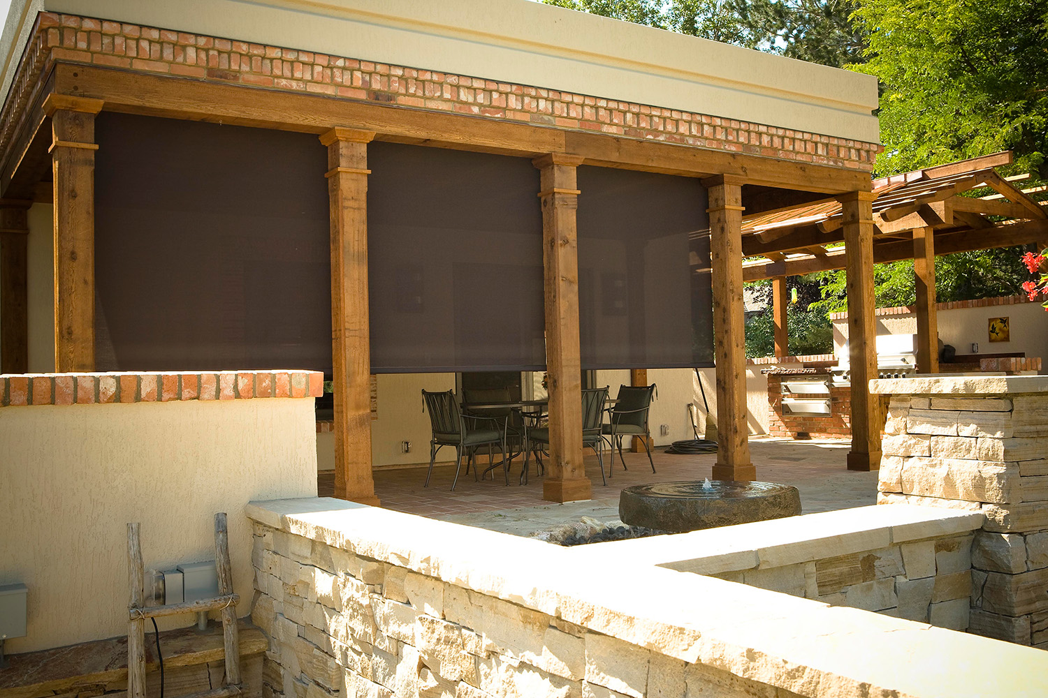home gym with brown solar screen roller shades