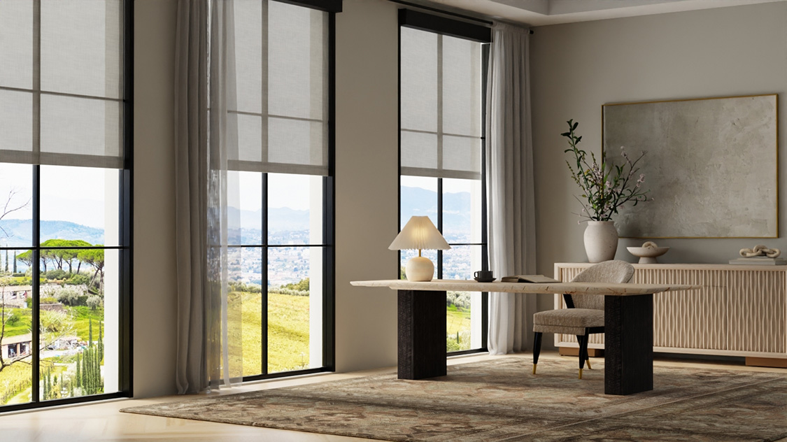 custom roller shades in organic modern office. grey fabric roller blinds with black valance and black window trim