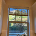 Sheerweave 5000 custom roller shades above kitchen sink