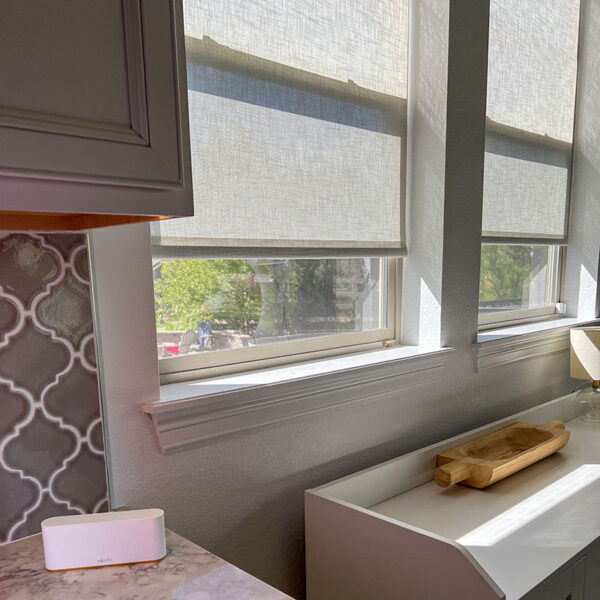 Somfy Tahoma Switch with Santorini Roller Shades in Kitchen